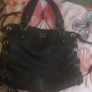 I am selling a mk bag and I only used 1 time
